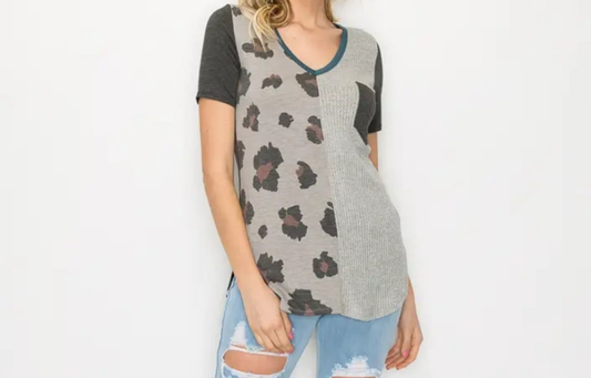 Animal and solid fabric block plus size top